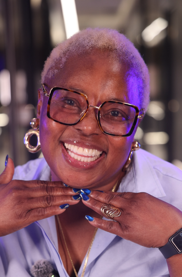 Mrs. Giwa smiling after her zirconia crowns in Albania at HMC, Tirana